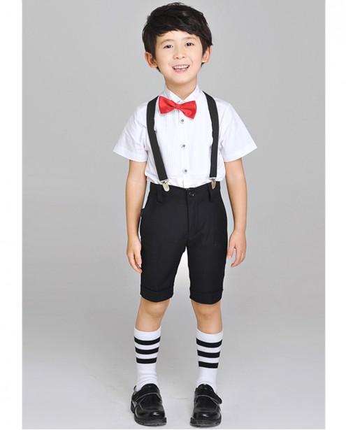 black dress shirt with white suspenders man in white shirt and black tie with white suspenders Stock Photo